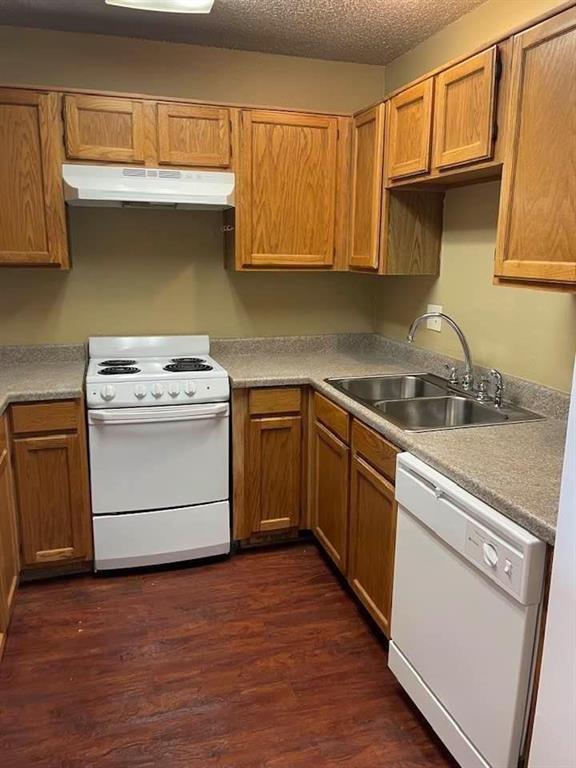 12 Trails Place, Unit AD Wylie, TX 75098 - Photo 23 of 40 a kitchen with a stove sink and cabinets