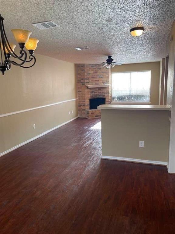 12 Trails Place, Unit AD Wylie, TX 75098 - Photo 25 of 40 an empty room with windows and fireplace