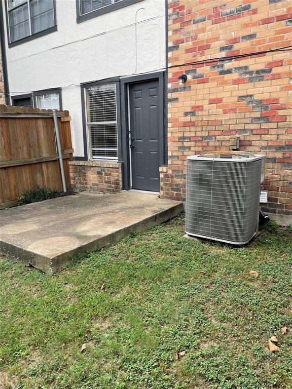 12 Trails Place, Unit AD Wylie, TX 75098 - Photo 27 of 40 a view of backyard with barbeque grill and wooden fence
