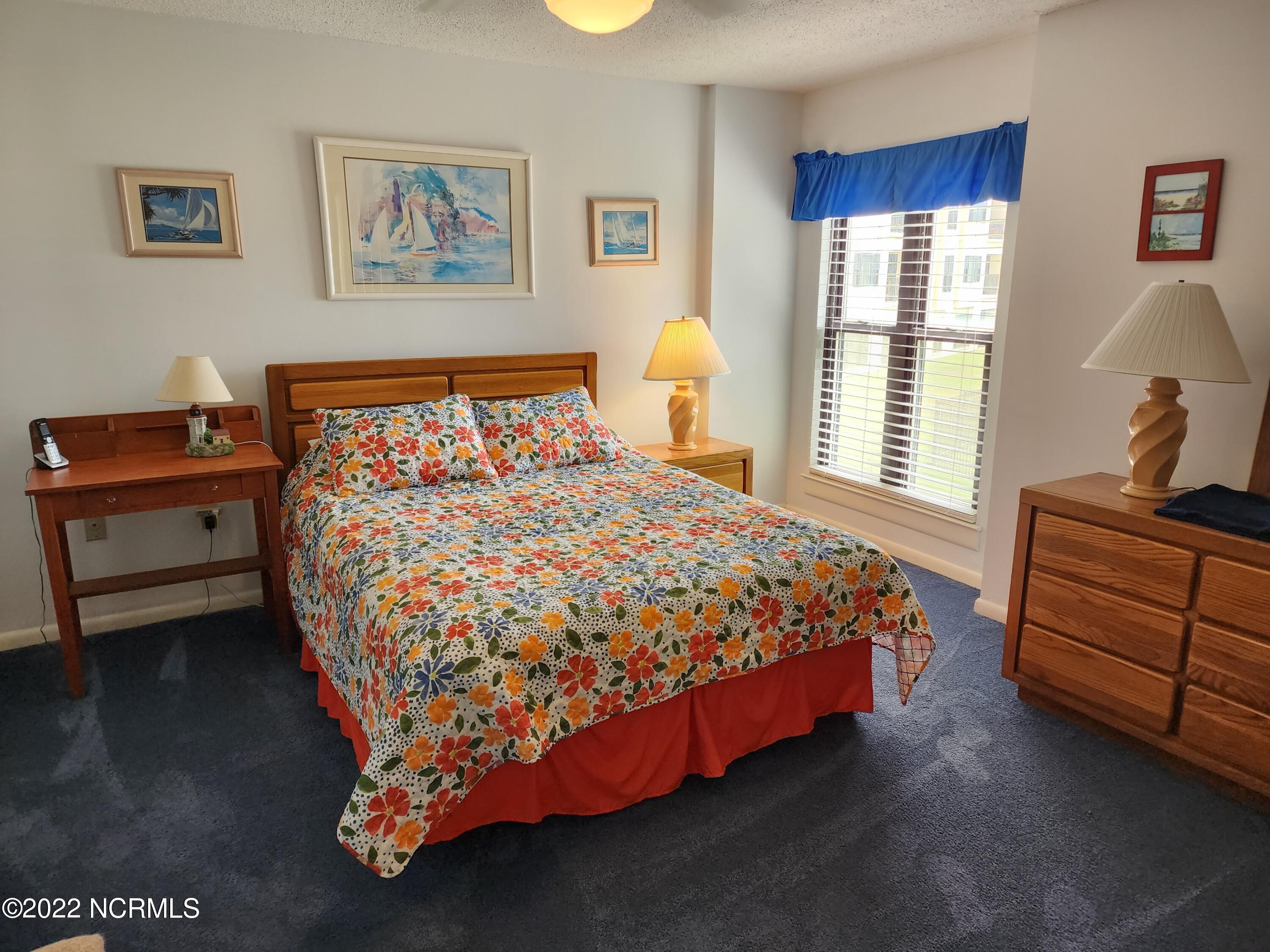 1505 Salter Path Road, Unit A212 Atlantic Beach, NC 28512 - Photo 10 of 33 Master Bedroom