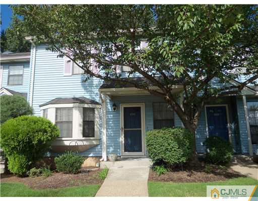 804 Maplecrest Road Edison, NJ 08820 - Photo 1 of 12 a front view of a house with garden