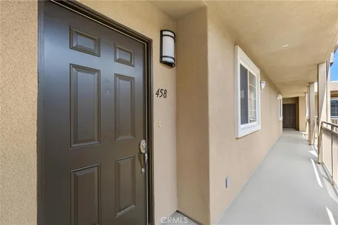 a view of a hallway with windows