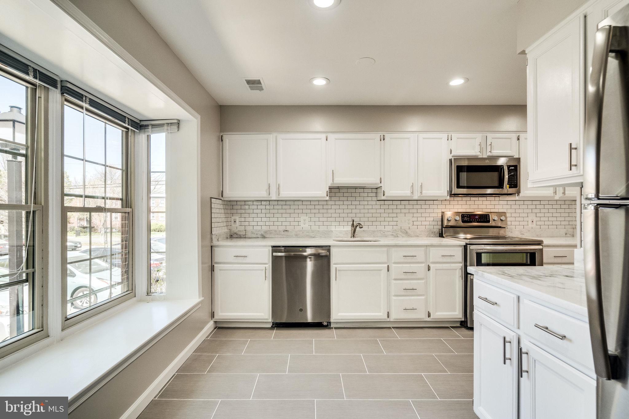 408 West Glebe Road Alexandria, VA 22305 - Photo 7 of 62 Kitchen with lots of natural light