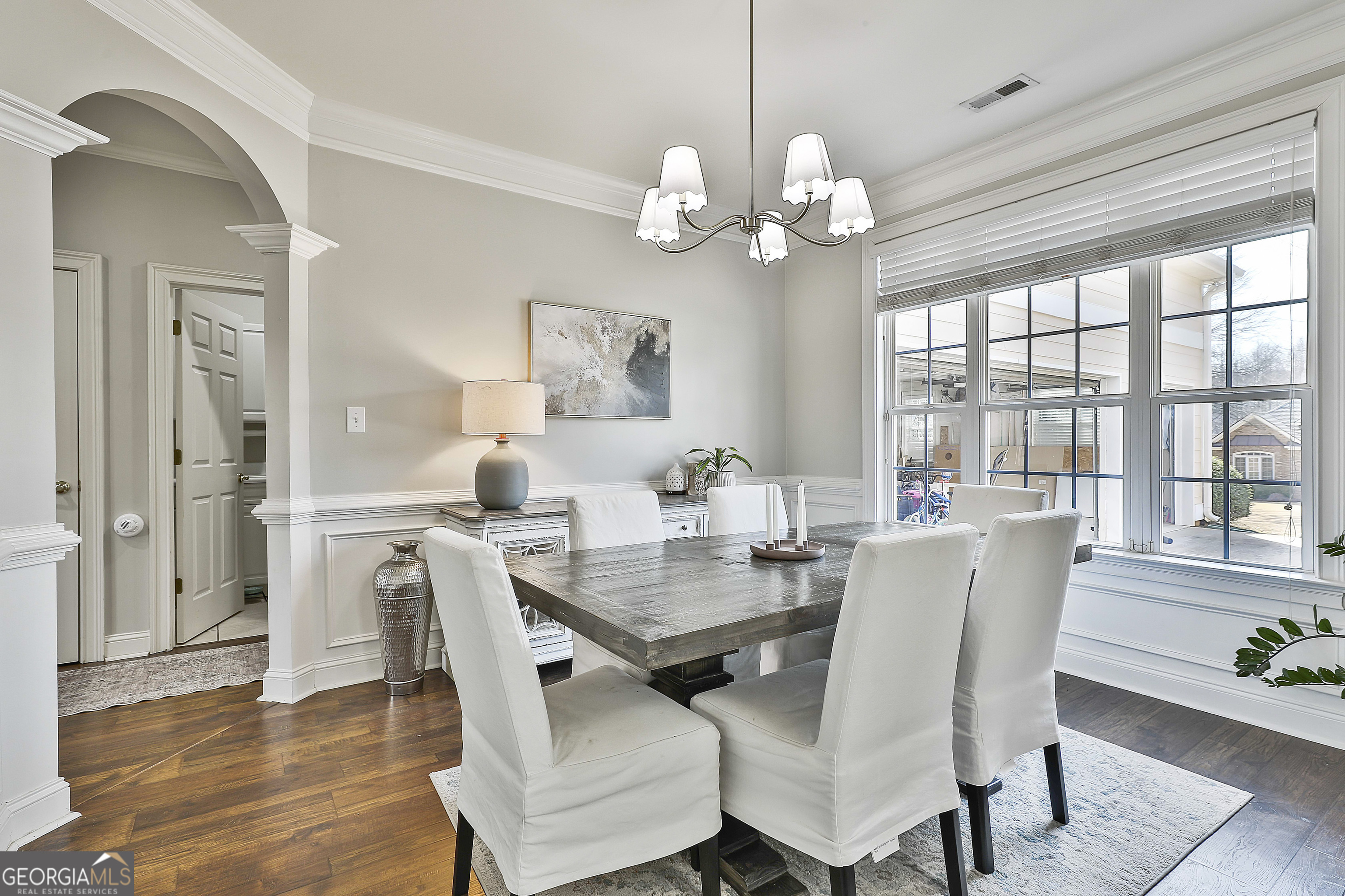 80 Middleton Trace Newnan, GA 30265 - Photo 11 of 92 a view of a dining room with furniture wooden floor and chandelier