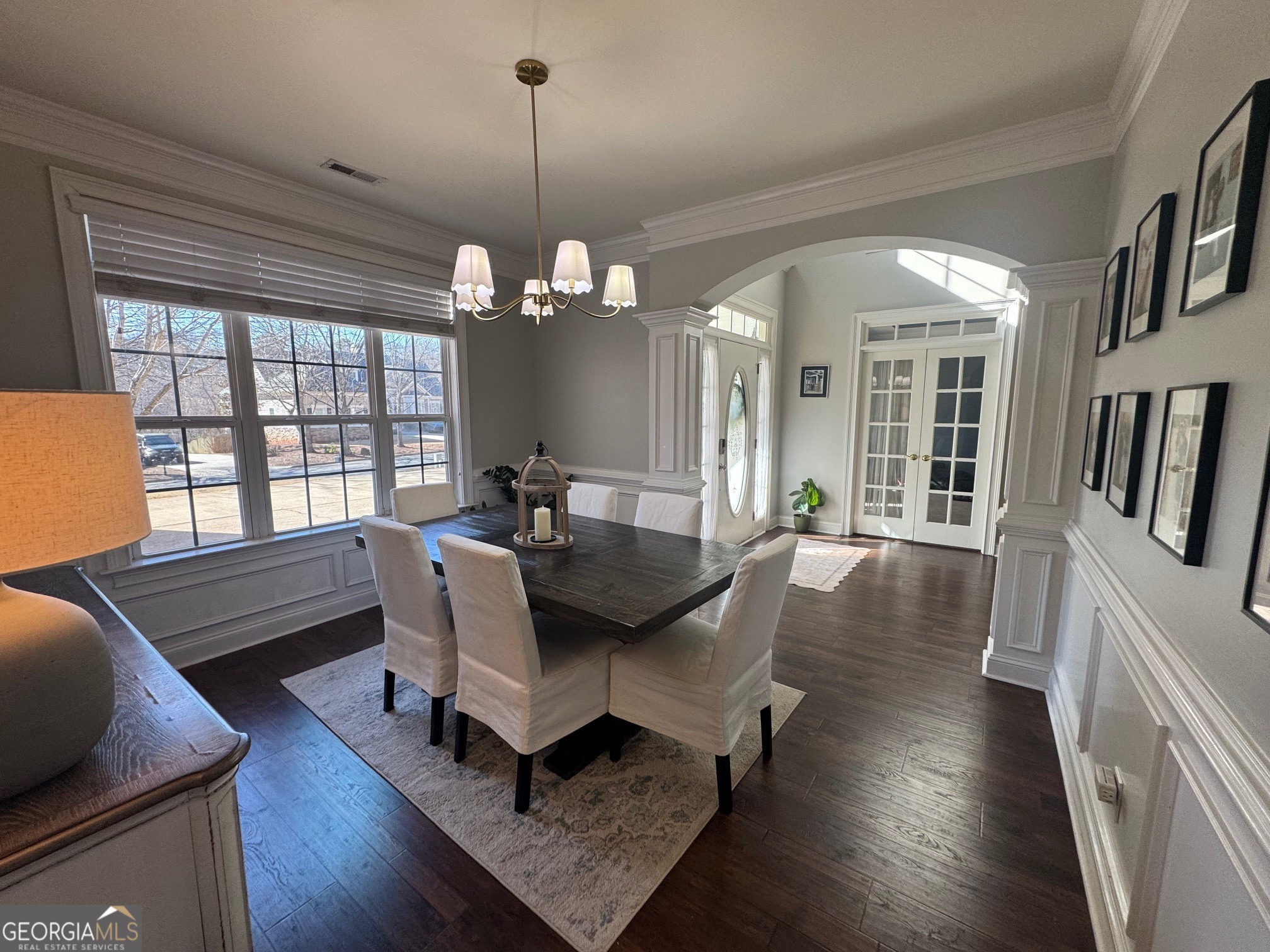 80 Middleton Trace Newnan, GA 30265 - Photo 5 of 30 a living room with furniture dining table wooden floor and a chandelier