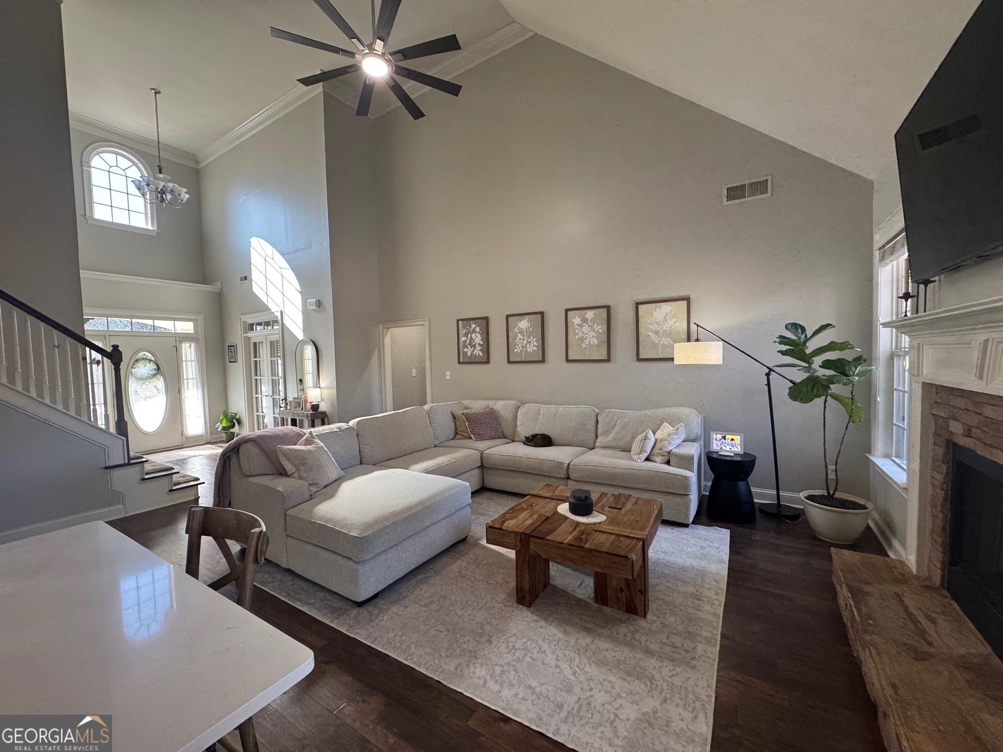 80 Middleton Trace Newnan, GA 30265 - Photo 6 of 30 a living room with furniture and a flat screen tv