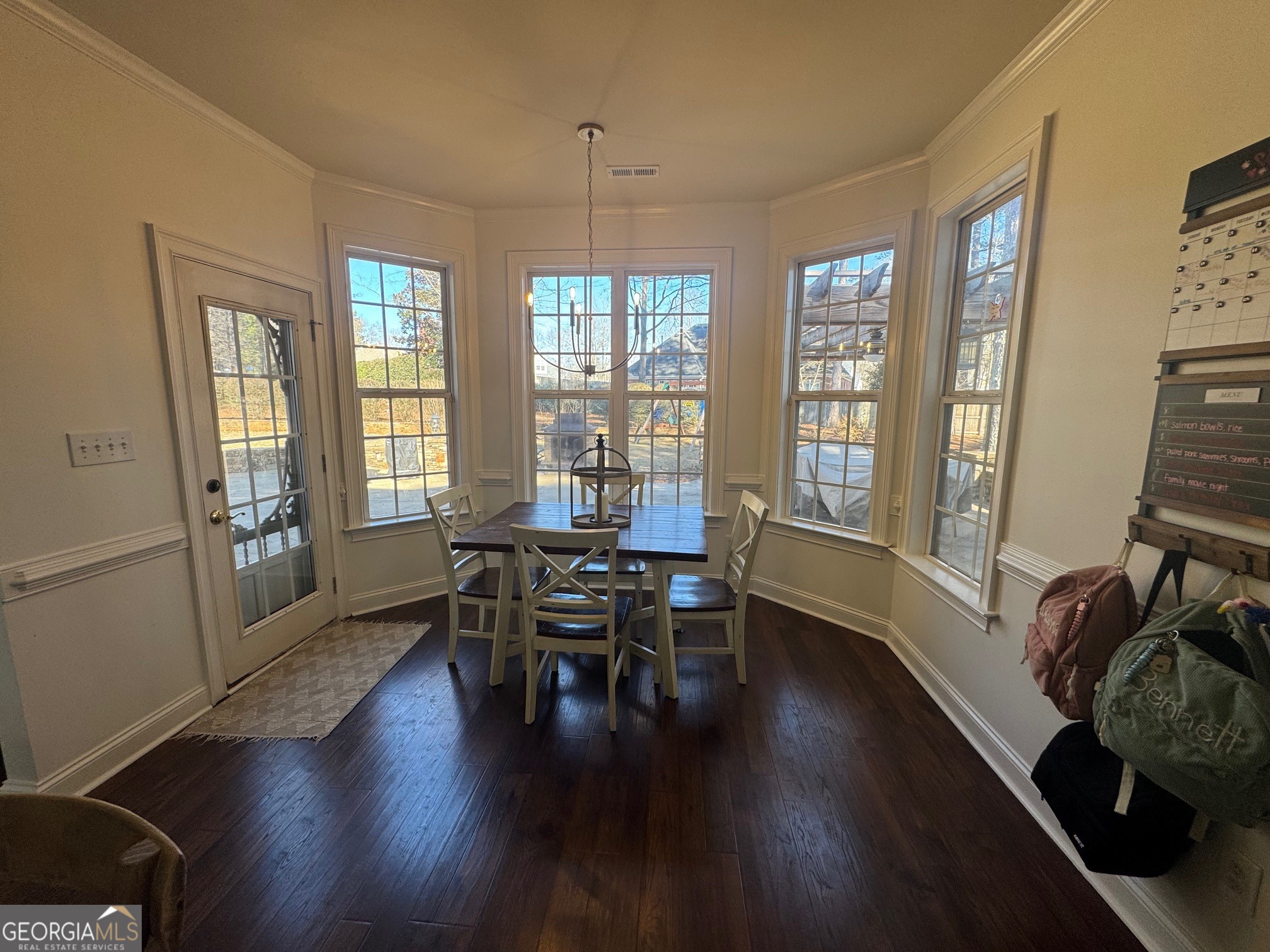 80 Middleton Trace Newnan, GA 30265 - Photo 8 of 30 a view of a dining room with furniture window and wooden floor