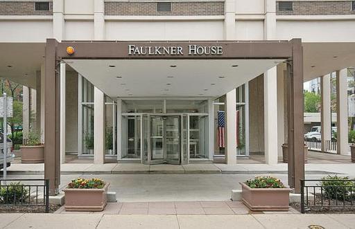 70 West Burton Place, Unit 1203 Chicago, IL 60610 - Photo 1 of 1 a front view of a building with a potted plant