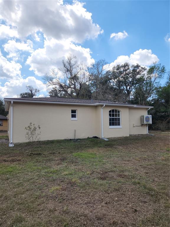 1652 Southwest Harlem Circle Arcadia, FL 34266 - Photo 15 of 17 a view of a backyard