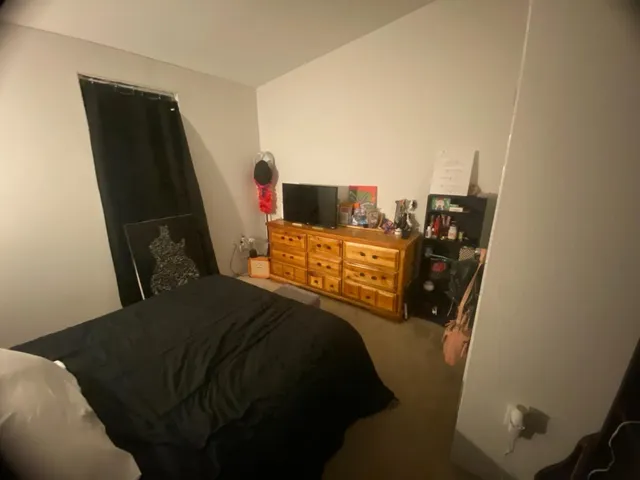 a bathroom with a sink toilet and mirror