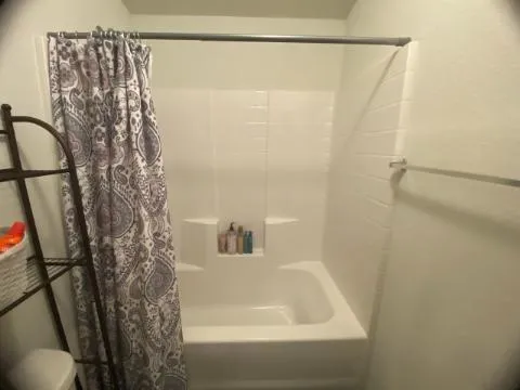 a bathroom with sink and mirror