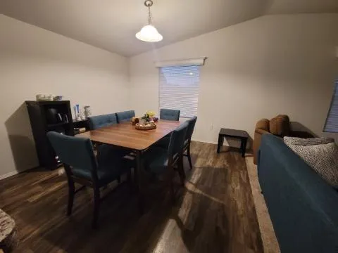 a view of a dining room with furniture