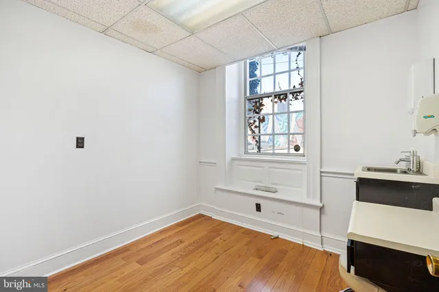 a room with a bed and a window