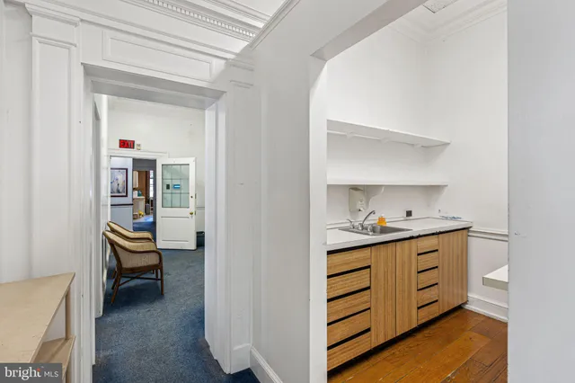 a room with furniture and a chair