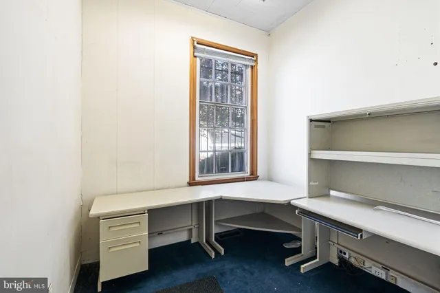 a room with chair and table