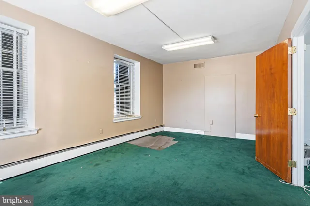 a view of an empty room with window