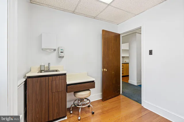 a room with a table and chairs