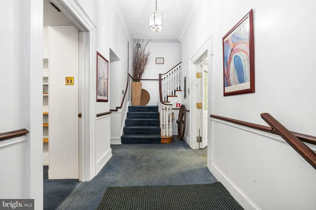 a view of an entryway with stairs