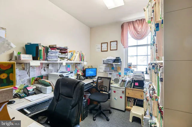 a room with furniture and a window