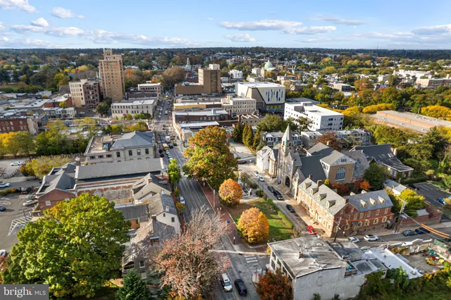 an aerial view of residential building and parking space