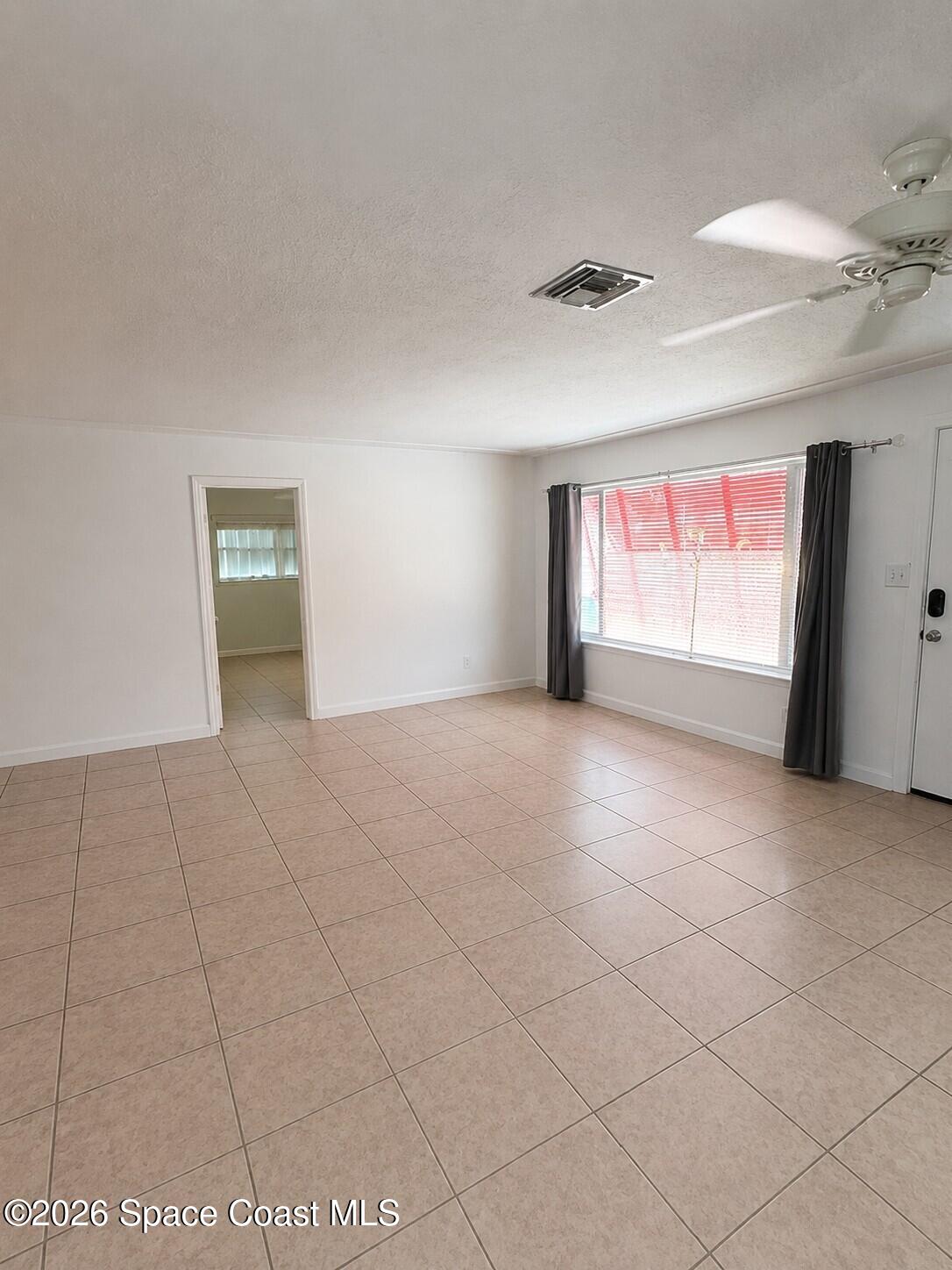 349 West Exeter Street Satellite Beach, FL 32937 - Photo 5 of 16 Living RM