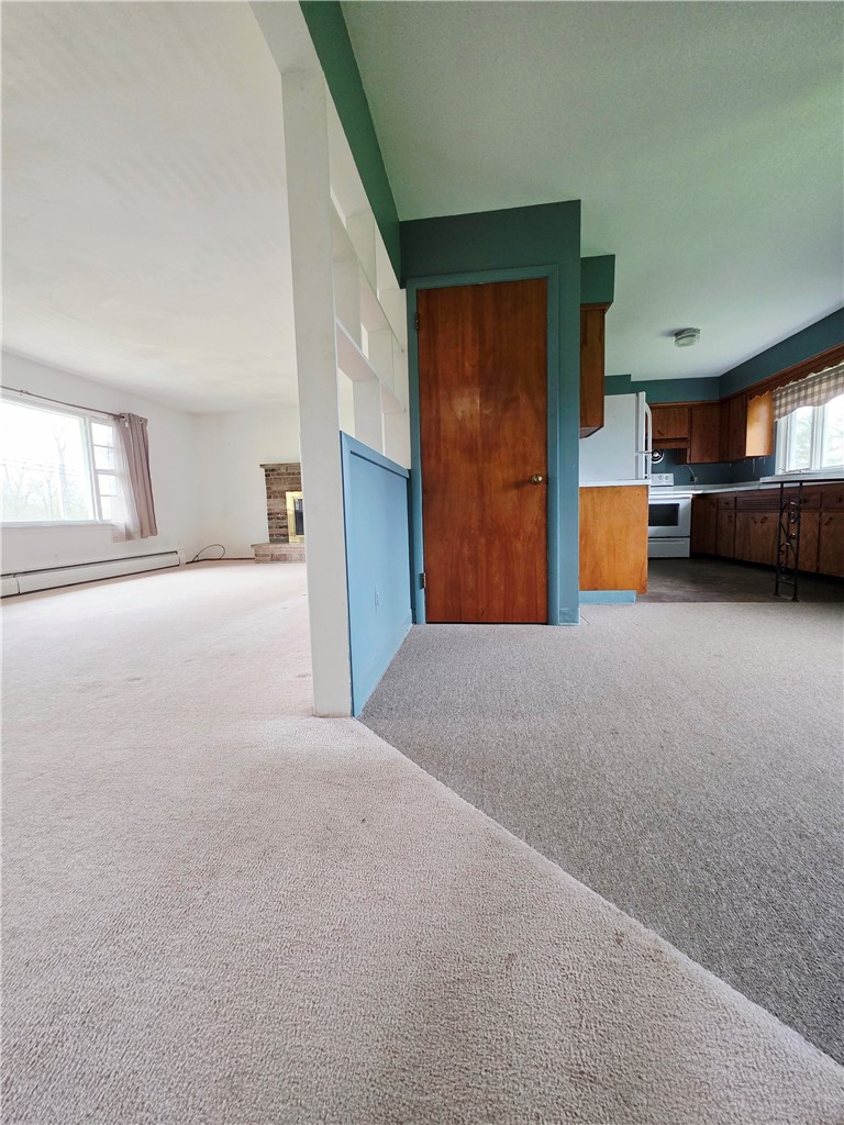 2247 Ridge Road Ontario, NY 14519 - Photo 13 of 36 Open views from dining area to livingroom