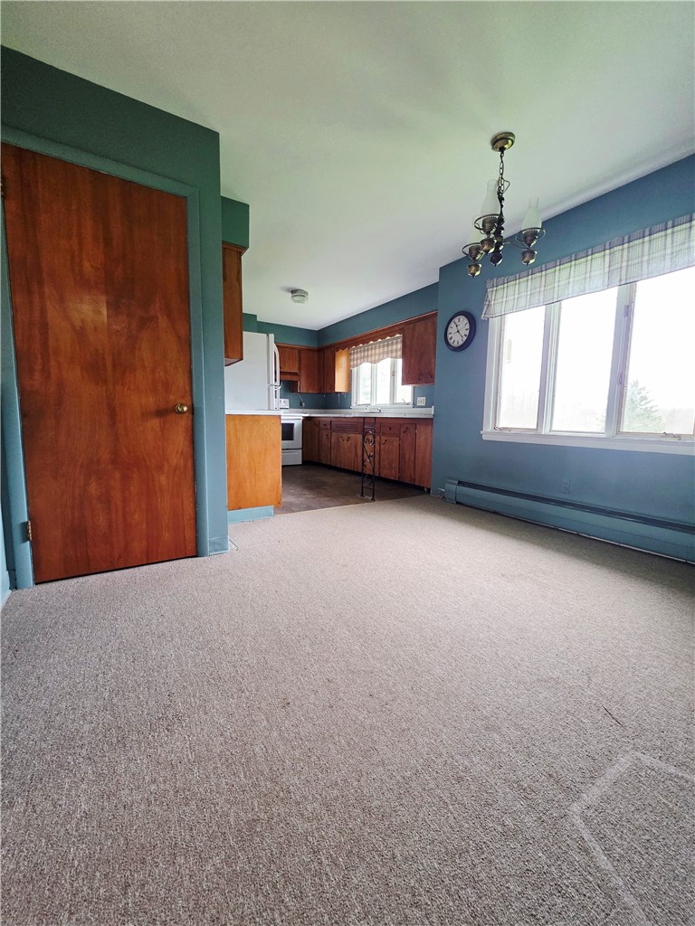 2247 Ridge Road Ontario, NY 14519 - Photo 19 of 36 Dining area open to kitchen