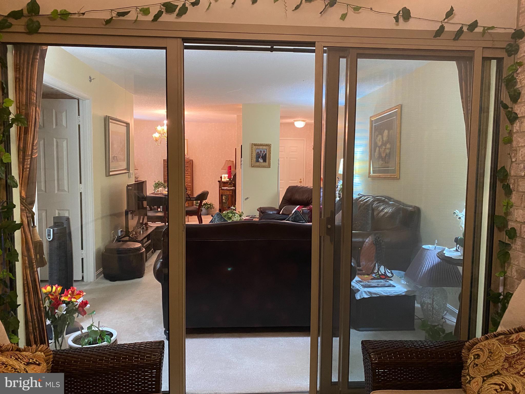 19385 Cypress Ridge Terrace, Unit 802 Leesburg, VA 20176 - Photo 7 of 15 View from solarium into the home