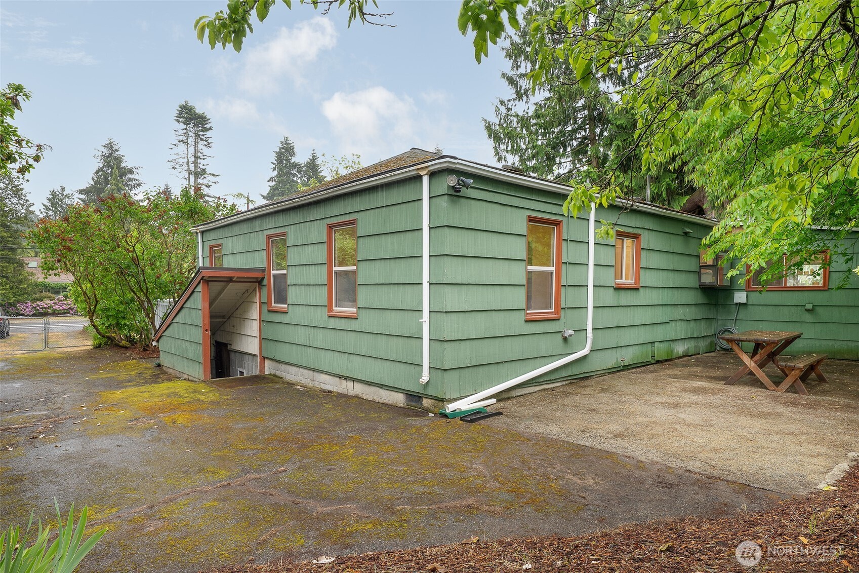 17633 10th Avenue Northeast Shoreline, WA 98155 - Photo 26 of 33 a view of a house with a yard