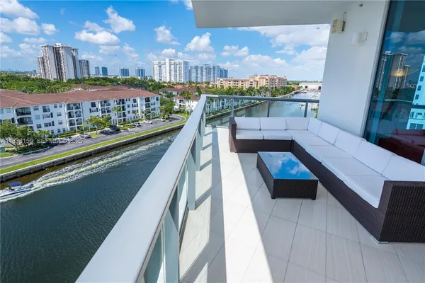a view of swimming pool from a balcony