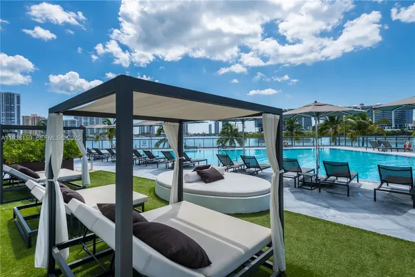 a view of a patio with swimming pool