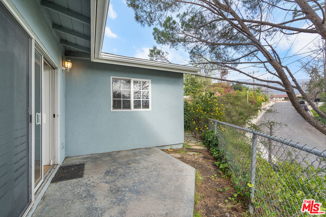 9631 Crystal View Drive Tujunga, CA 91042 - Photo 35 of 37 a view of a house with a yard