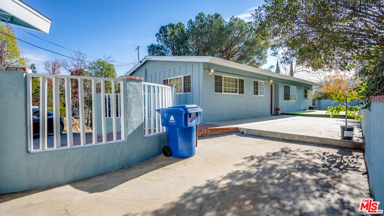 9631 Crystal View Drive Tujunga, CA 91042 - Photo 7 of 37 a front view of a house with a yard