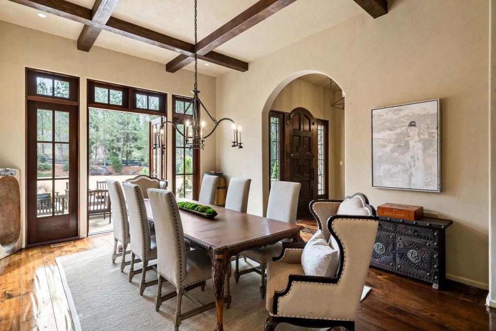 550 Blue Heron Way Milton, GA 30004 - Photo 38 of 108 a view of a dining room with furniture window and wooden floor