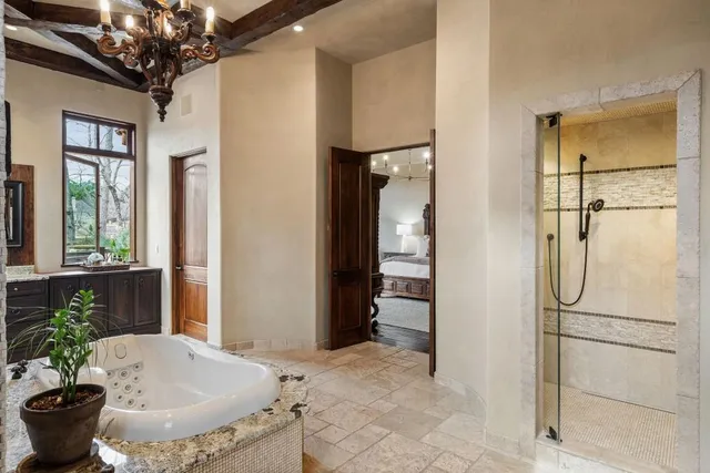 a view of a lake with houses in the background