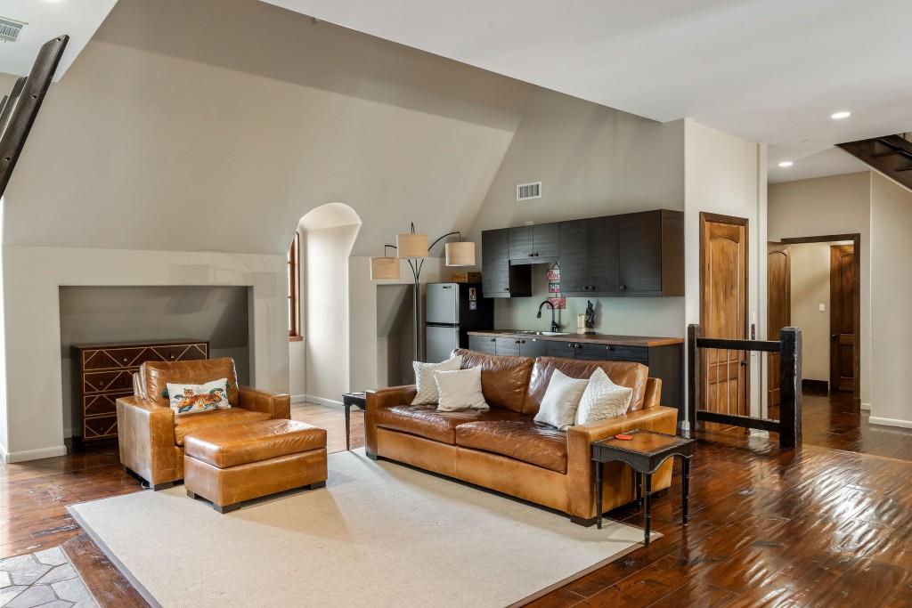 550 Blue Heron Way Milton, GA 30004 - Photo 71 of 108 a living room with furniture and a wooden floor