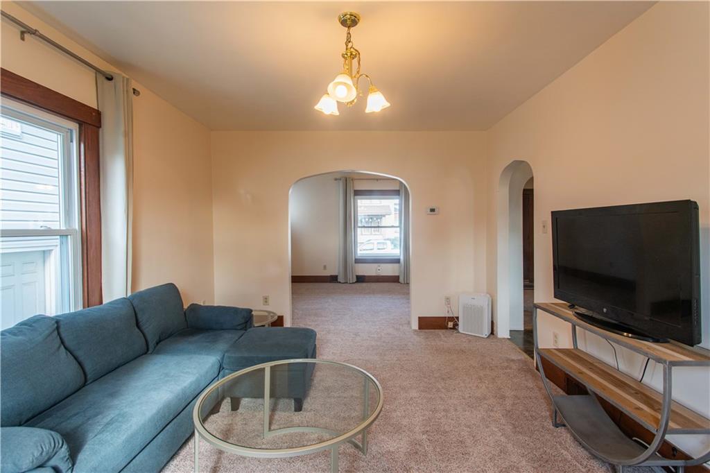 1618 North 3rd Street New Brighton, PA 15066 - Photo 12 of 28 a living room with furniture and a flat screen tv