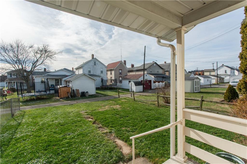 1618 North 3rd Street New Brighton, PA 15066 - Photo 25 of 28 a view of a house with a big yard and a large tree