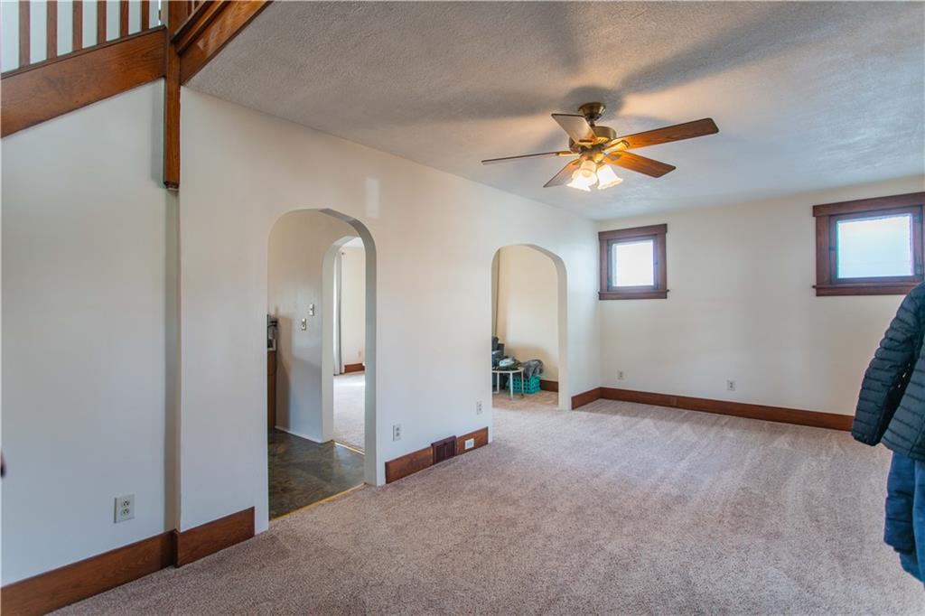 1618 North 3rd Street New Brighton, PA 15066 - Photo 8 of 28 an empty room with windows and fan