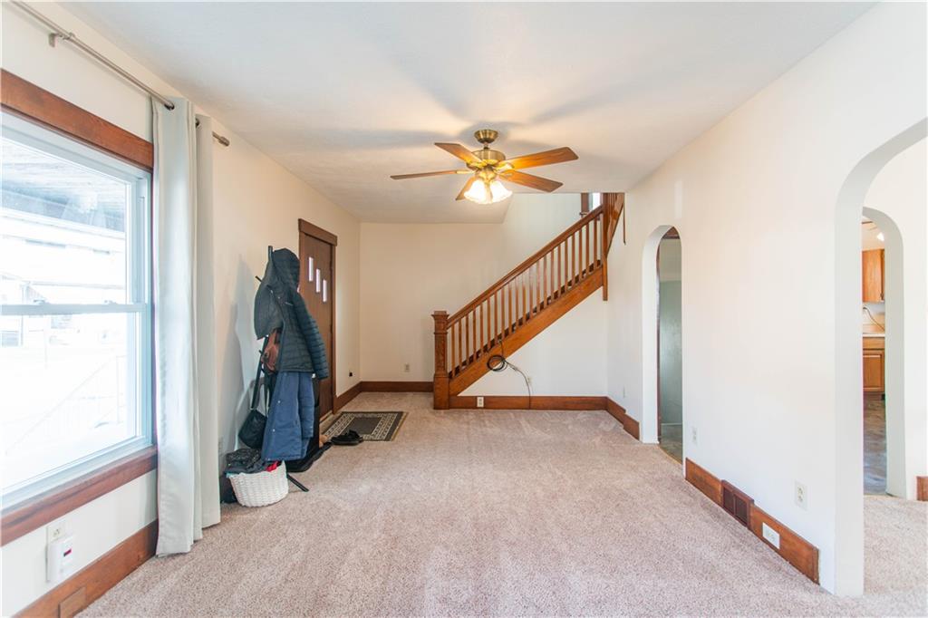 1618 North 3rd Street New Brighton, PA 15066 - Photo 10 of 28 a view of a hallway with a window and a ceiling fan