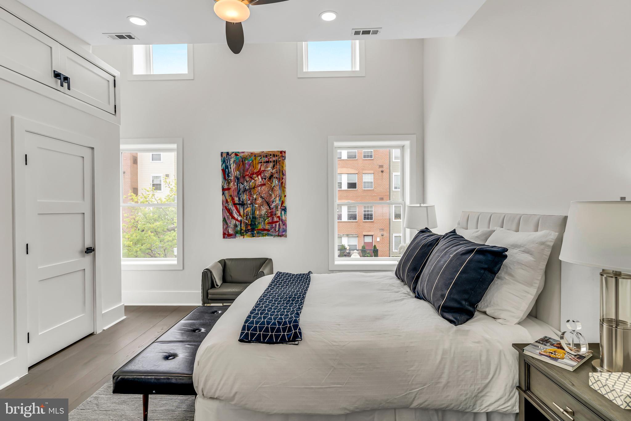 112 Todd Place Northeast Washington, DC 20002 - Photo 34 of 73 a bedroom with a bed and wooden floor