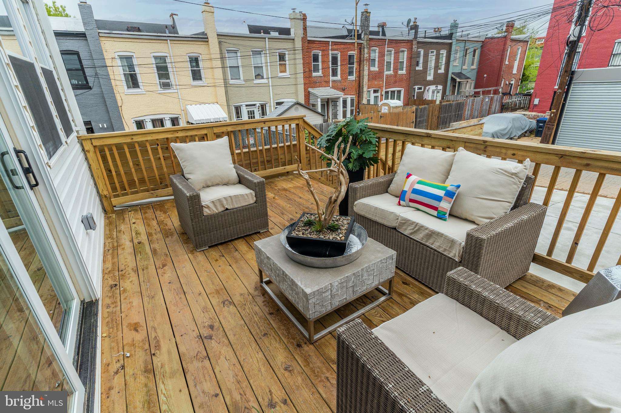 112 Todd Place Northeast Washington, DC 20002 - Photo 70 of 73 a view of a living room with furniture and a book shelf