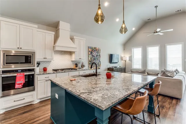 a bedroom with two beds and a window