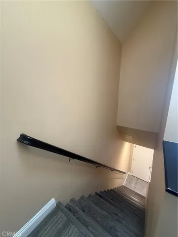 a view of a hallway with washer and dryer