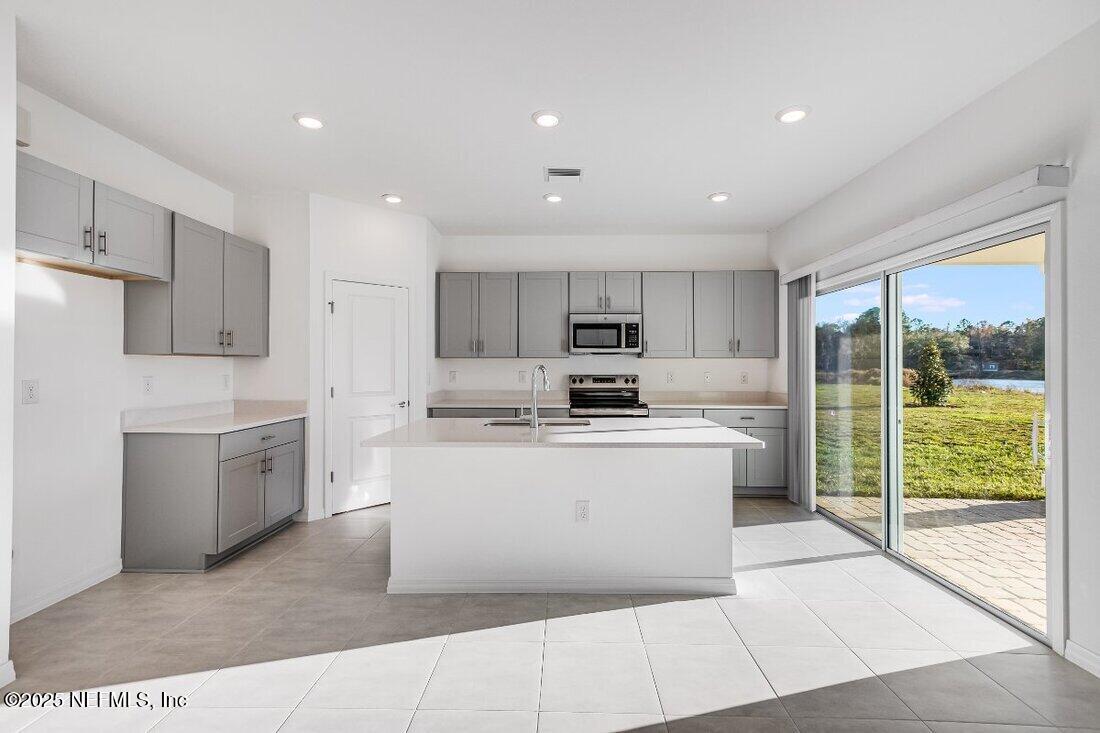 8525 Lilias Circle Jacksonville, FL 32219 - Photo 13 of 32 hj-fl-jacksonville-coopers-meadow-ficus-