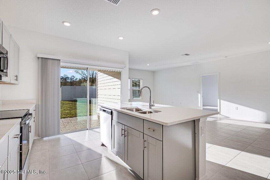 8525 Lilias Circle Jacksonville, FL 32219 - Photo 8 of 32 hj-fl-jacksonville-coopers-meadow-ficus-