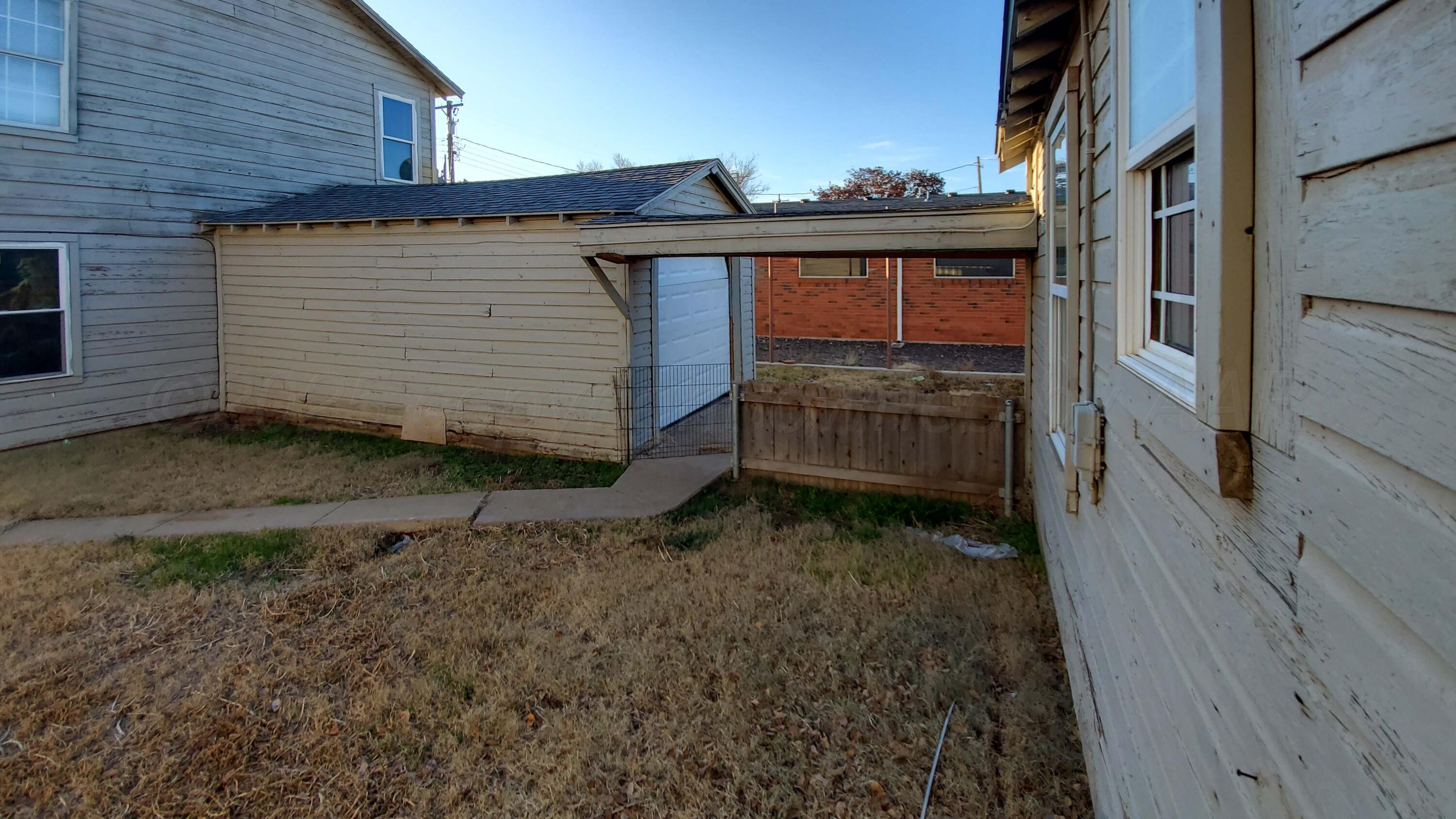 809 South Bryan Street Amarillo, TX 79106 - Photo 21 of 22 a view of a house with a yard