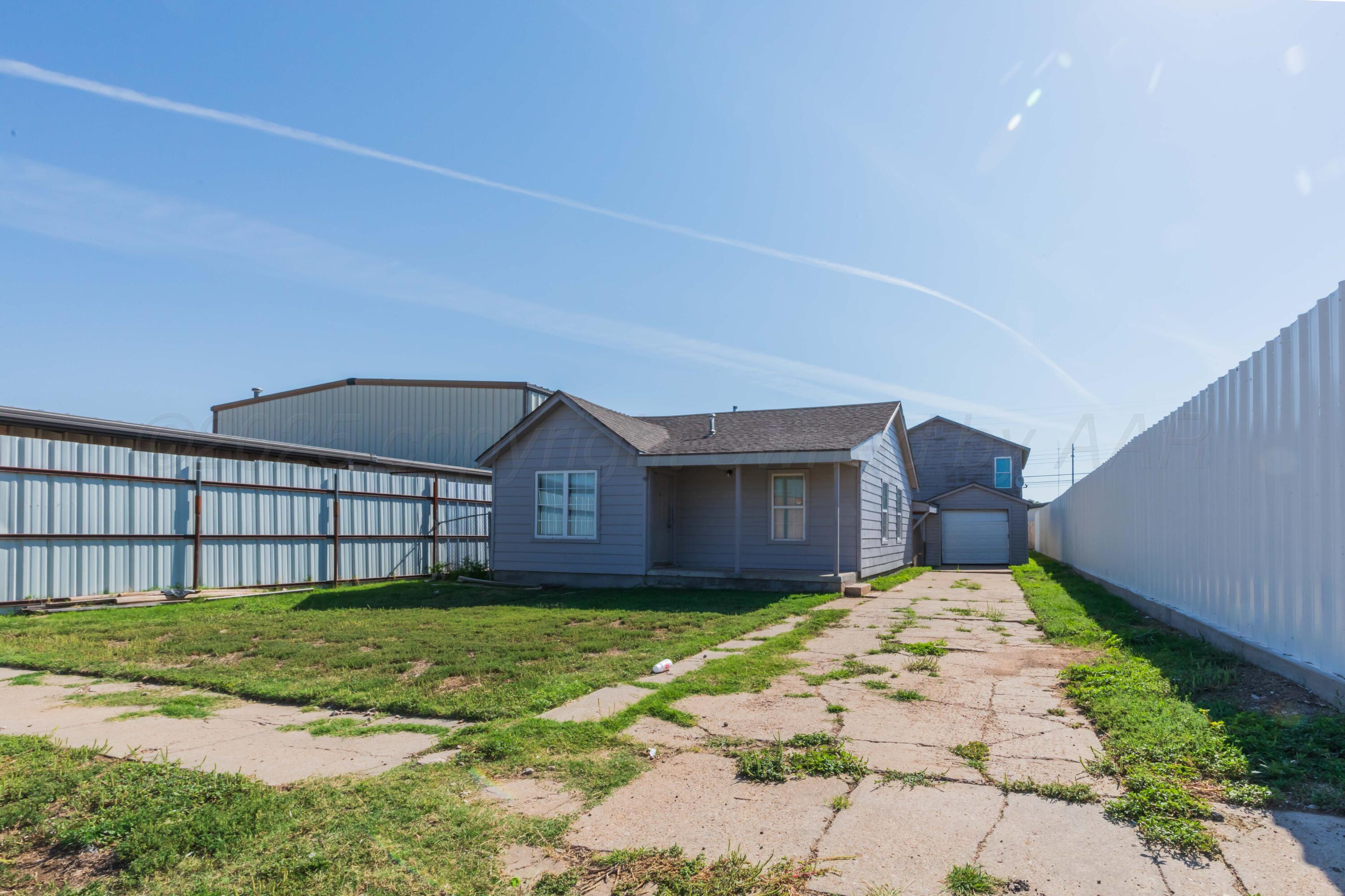 809 South Bryan Street Amarillo, TX 79106 - Photo 3 of 22 a view of a house with a yard