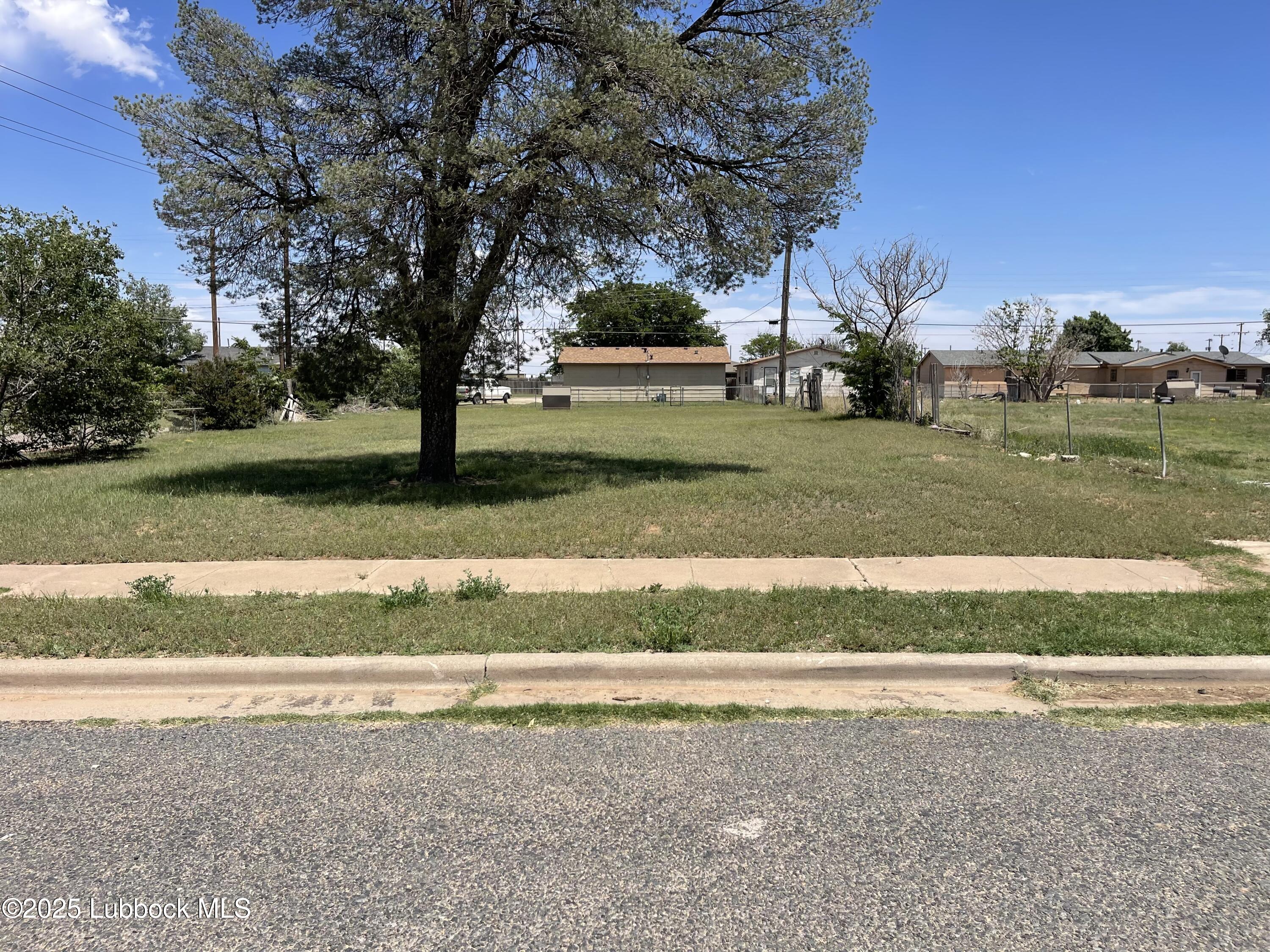 2101 Date Avenue Lubbock, TX 79404 - Photo 5 of 5 a front view of a house with a yard