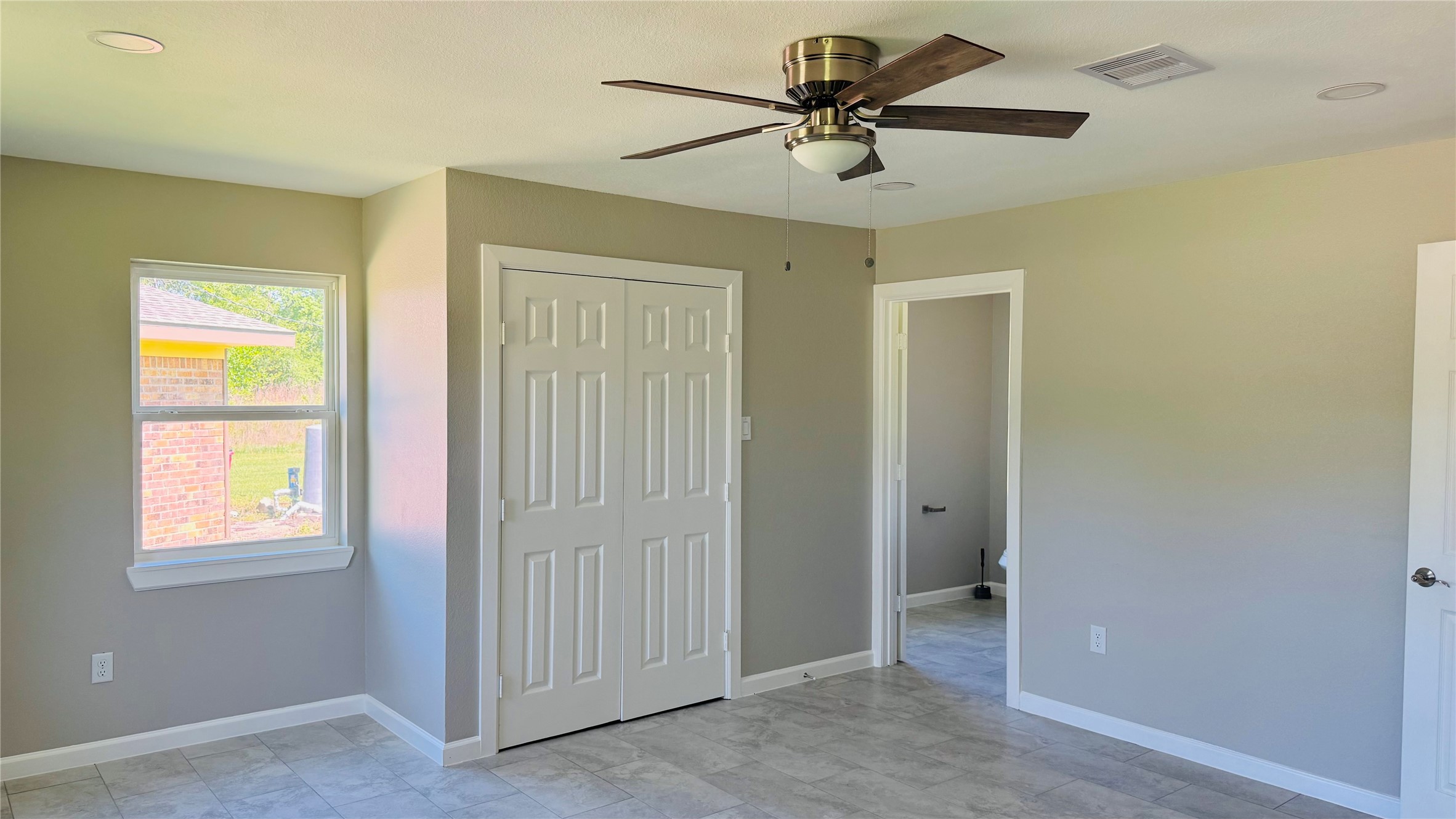 1434 County Road 878A Sweeny, TX 77480 - Photo 33 of 36 a view of an empty room with a window
